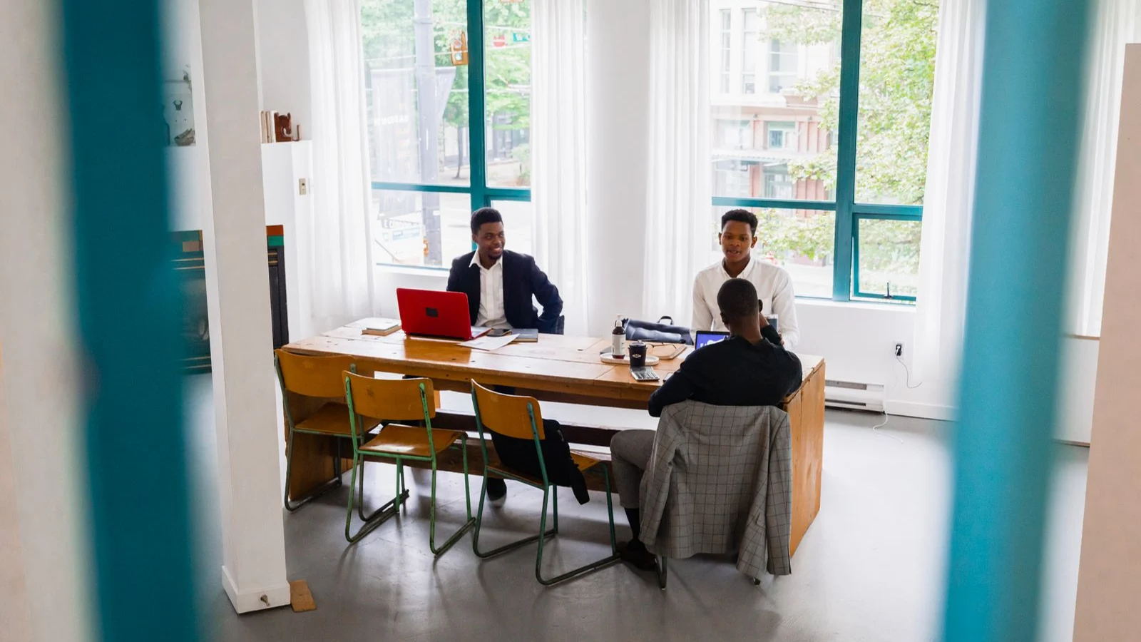 Colleagues meeting in a bright office